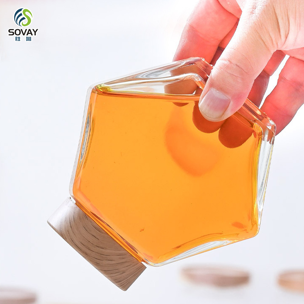 SG10N Wholesale Honey Jar Glass Hexagon Shape Honey Jar Glass with Wooden Dipper and Cork Lid Cover Honey Syrup Storage