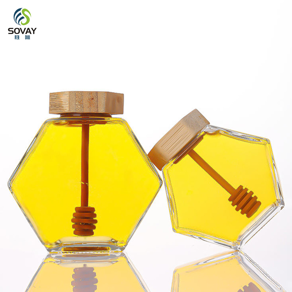 SG10N Wholesale Honey Jar Glass Hexagon Shape Honey Jar Glass with Wooden Dipper and Cork Lid Cover Honey Syrup Storage