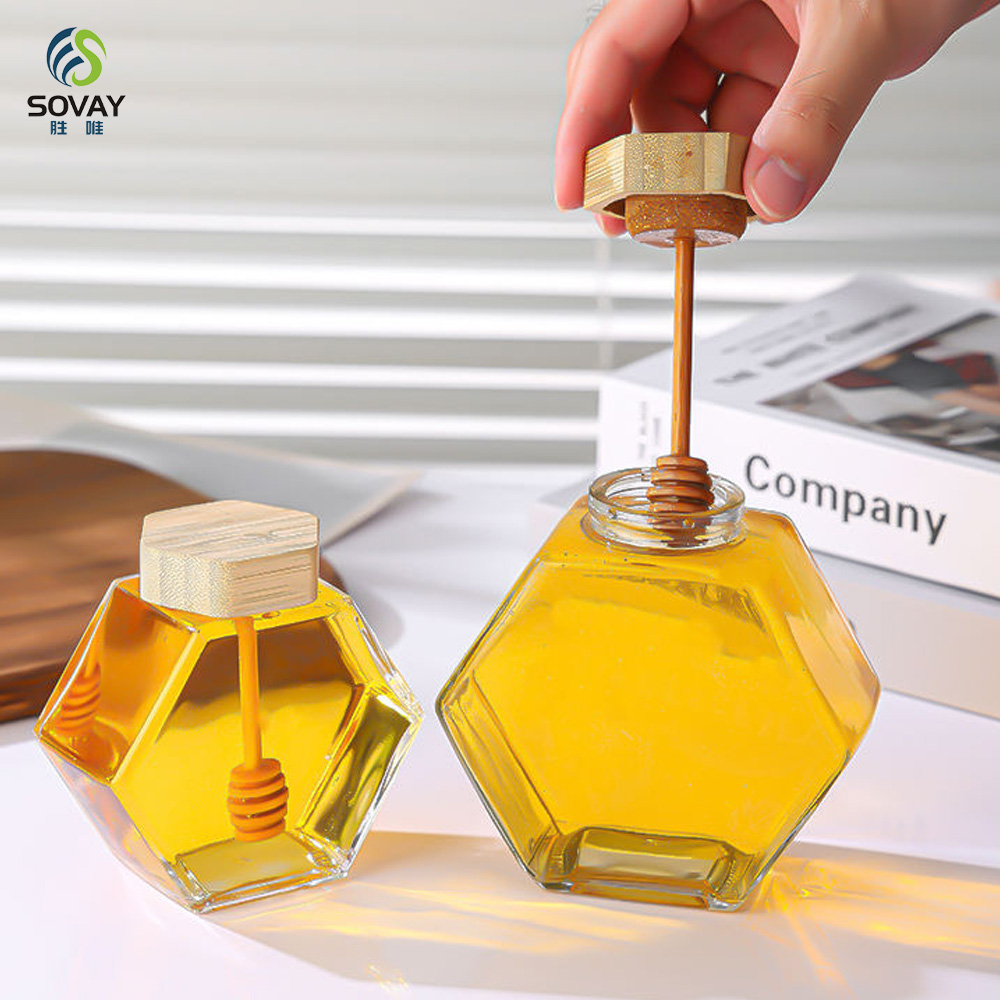SG10N Wholesale Honey Jar Glass Hexagon Shape Honey Jar Glass with Wooden Dipper and Cork Lid Cover Honey Syrup Storage